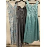3 vintage 1950's satin sleeveless, full length evening dresses in blue & silver tones. To include
