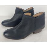 A pair of women's Fat Face black leather ankle boots, size 6½/40. With zipped sides, small chunky