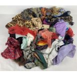 A quantity of assorted scarves in varying styles and colours.