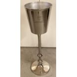 A large silver plated free standing Bollinger Champagne bucket on a turned pedestal base. Approx.