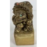 A large Chinese gilt bronze seal with dragon shaped finial and set with turquoise and coral