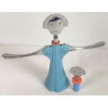 An Alessi Alessandro Mendini, 1994 'Anna' corkscrew bottle opener, in blue. Together with a matching