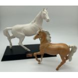 Royal Doulton "Spirit of the Wind" horse figure together with a Beswick Palomino (a/f). Spirit of