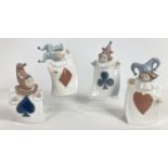 A set of 4 retired Nao porcelain playing card jester figurines. Approx. 18cm tall.