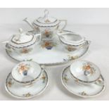 An early 20th century MZ Altrohlau CM-R, Czechoslovakia, ceramic tea for two set. With floral