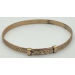 A vintage 9ct rolled gold expanding christening bracelet with classic floral engraved pattern. 6.5cm