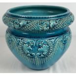 A 1937 Burmantofts Faience jardiniere in turquoise glaze. With moulded scroll and foliate design.