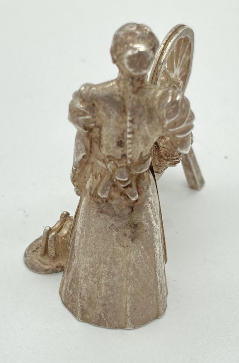A vintage silver miniature model of a woman working a spinning wheel. Fully Hallmarked to base for - Image 3 of 4