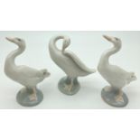 A set of 3 small ceramic figures of geese by Lladro. Tallest approx. 11.5cm.