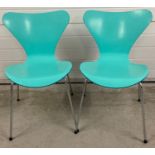 A pair of Fritz Hansen, Denmark, series 7 bentwood dining chairs, painted green. With chrome legs.