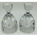 A large pair of multi faceted Art Deco style clear glass scent bottles. With screw top lids and