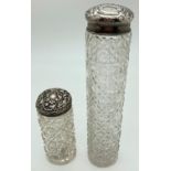 2 Edwardian cut glass, silver topped, cylindrical vanity pots. With embossed scroll and foliate
