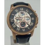 A men's chronograph style ME3029 111602 automatic skeleton wristwatch with rose gold tone case and