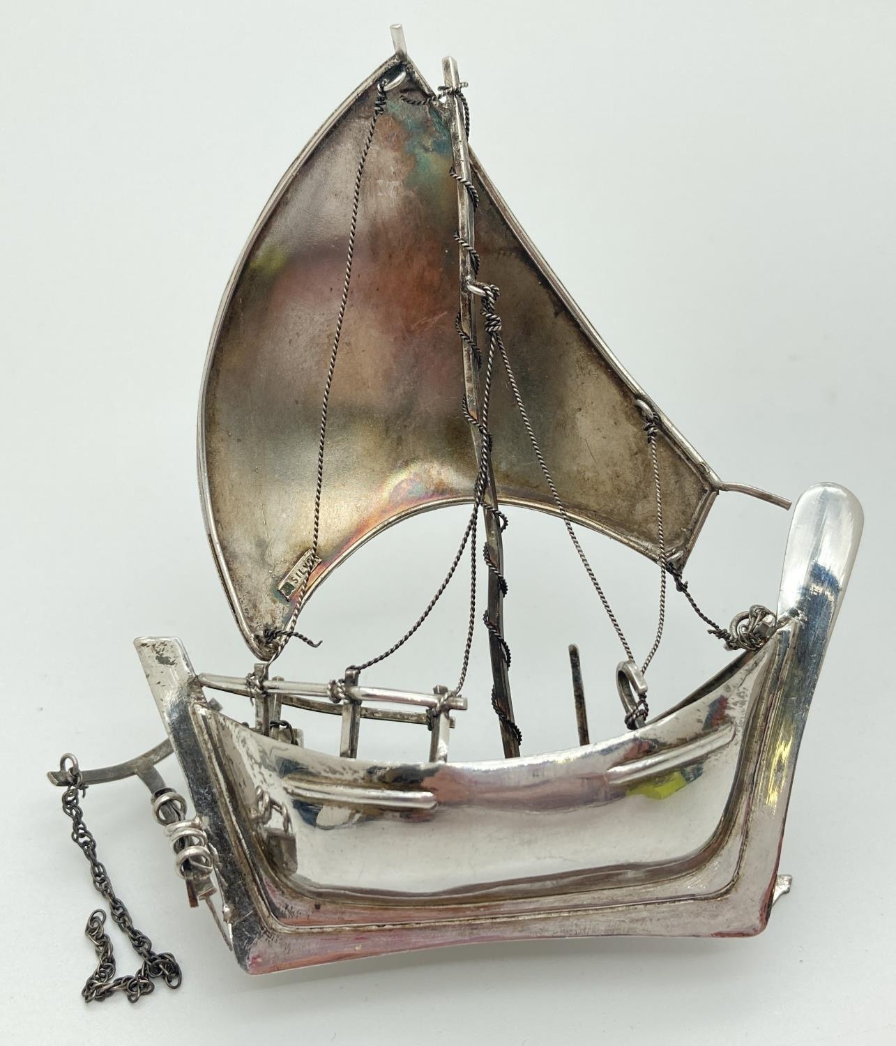 A vintage silver miniature sailing boat figurine with rudder, anchor and bailing bucket. Marked - Image 4 of 5