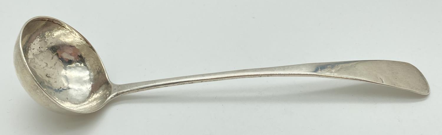 A Scottish Georgian silver sauce ladle of simple design. Hallmarked to reverse of handle for Glasgow