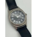 A 1990's "Mood Watch" by Fossil with black leather strap. Stainless steel case with colour