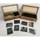 2 vintage wooden cases of glass photographic slides, to include: people in period dress, mountain