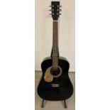 A vintage early 1980's black lacquer left handed acoustic guitar by Hondo, Korea. Model No.