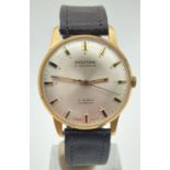 A vintage Montine Of Switzerland 17 jewels men's wristwatch with brown leather strap. Pale silver