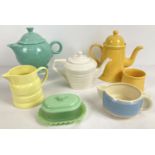 A collection of vintage ceramic tea ware to include matching yellow Arthur Woods teapot & sugar