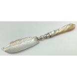 A Victorian silver butter knife with carved mother of pearl handle in a twisted design. Curved blade