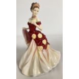 Royal Doulton ceramic figurine "Autumn Ball" #HN5465 from the Pretty Ladies range. Approx. 23cm
