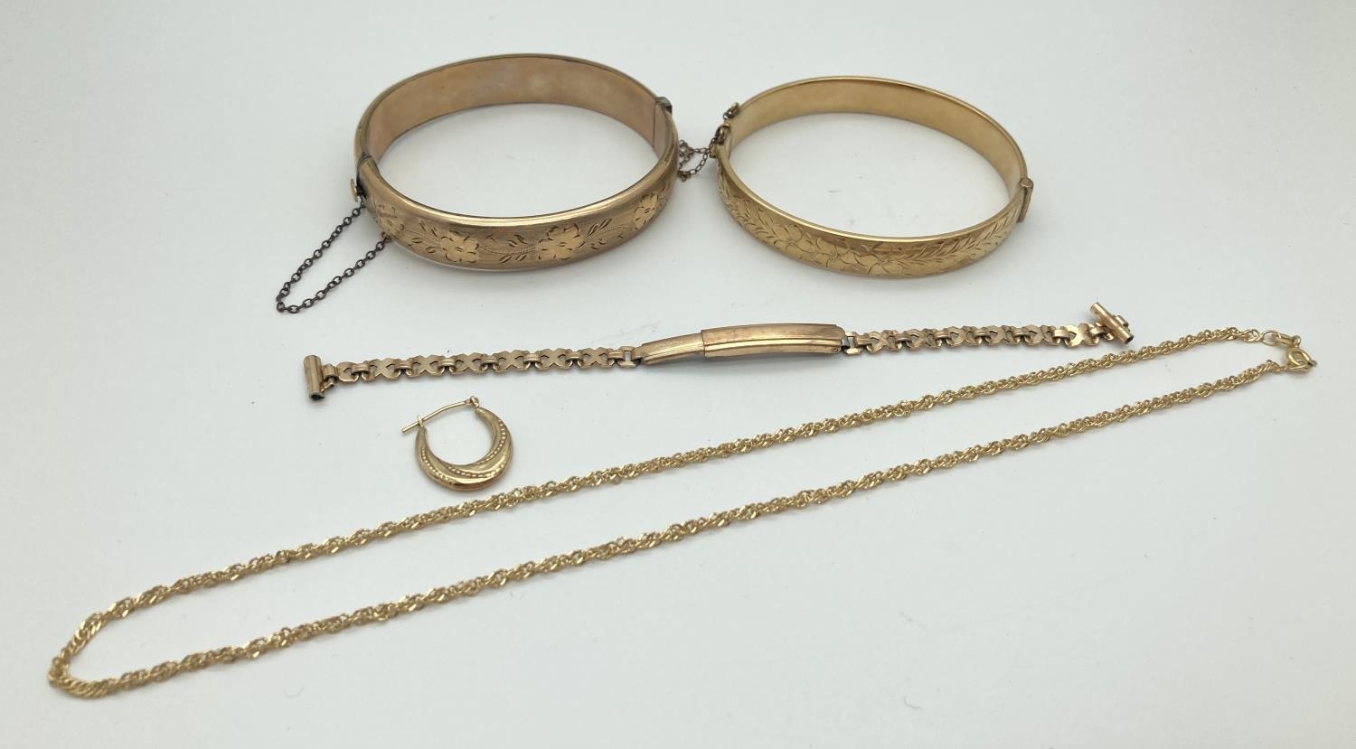 A collection of vintage and modern rolled gold and bonded gold jewellery. To include 2 x bangles