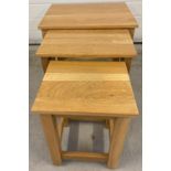 A modern solid light oak nest of 3 tables with square legs, by Koala Furnishings Ltd.