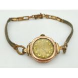 An Art Deco gold cased, Swiss made 15 jewels Unicorn ladies wrist watch. Fully hallmarked inside