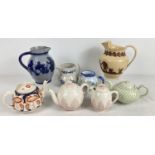 A collection of assorted antique & vintage ceramic jugs and teapots. To include: a Brameld