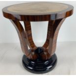An Art Deco design circular shaped occasional/lamp table. With multi-coloured wood veneer and high