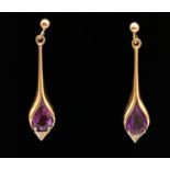 A pair of 9ct yellow gold drop earrings set with amethyst and diamonds. In a teardrop design, with