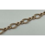 A 9ct gold decorative chain link bracelet with spring clasp. Approx 7 inches long. Clasp marked "