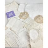 A collection of vintage & antique table linen with embroidered detail & lace trim.