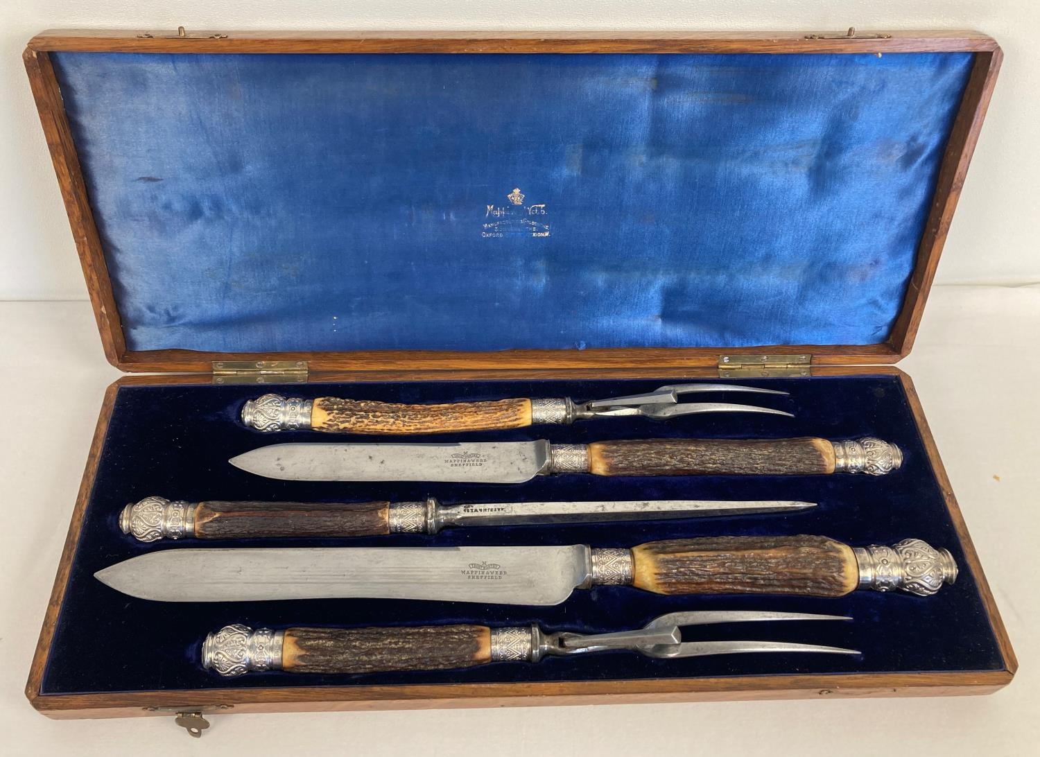 A Victorian Mappin & Webb silver mounted 5 piece carving set. One set for large meats and one for