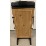 A Corby 7700 trouser press in pine finish. From a private clearance, not tried and tested.
