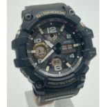 A G-Shock Mudmaster GWG 100 Multi Band 6 Tough Solar wristwatch with green plastic strap and black