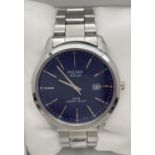 A mens boxed 431580 Solar wristwatch by Pulsar with blue face and stainless steel strap and case.