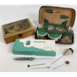 A collection of ladies vintage vanity items to include hat pins. Lot also includes green leather