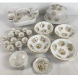 A quantity of assorted modern ceramics with peach coloured floral design. Comprising: Strawberry