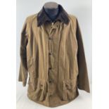 A men's A821 classic Moorland wax jacket by Barbour. Double fastener zip to front with press stud
