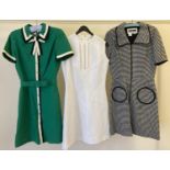 3 vintage 1960's day dresses. To include a black and white dogtooth check zip front dress (size