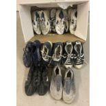 A box of men's worn trainers to include Converse, Nike, New Balance, Reebok and Williams F1.