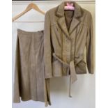 A vintage 1980's light brown womens suede fitted jacket with leather trim, button fastening, front