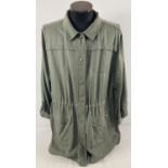 A ladies khaki green lightweight jacket with drawstring waist by Joules. Press stud fastening, two