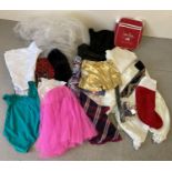 A collection of assorted theatre costume accessories. To include: scarves, veil, belts and netted
