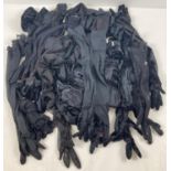 A box of assorted theatre costume long sleeved gloves to include lace and velvet examples.