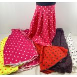 14 assorted theatre costume polka dot design swing skirts, in varying colours.