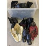 A large box of assorted vintage and theatre costume womens lace up Victorian style boots.