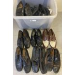 A large box of assorted vintage and theatre costume men's shoes. In varying styles and sizes.